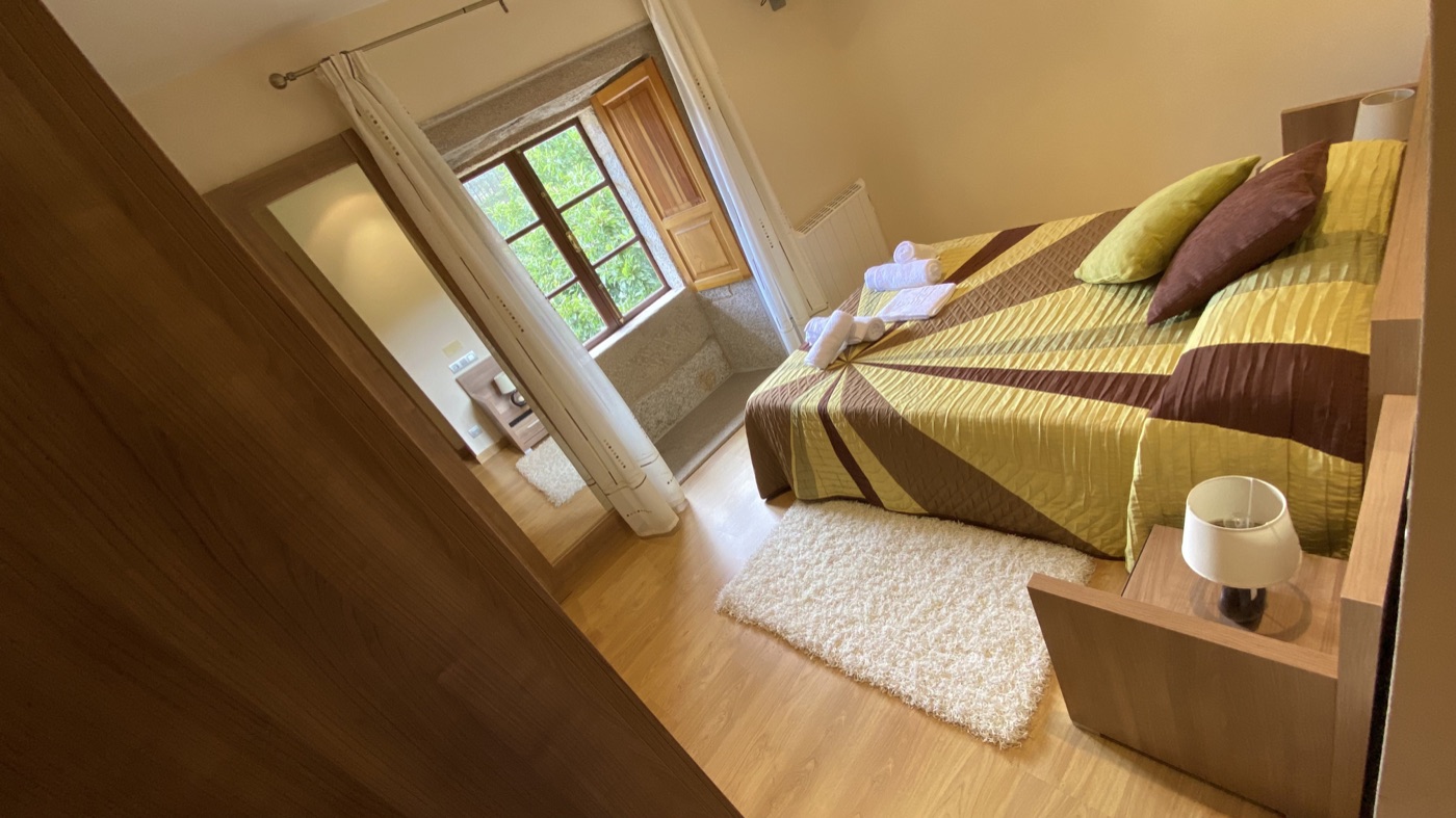 Dormitorio doble para descansar en la casa completa